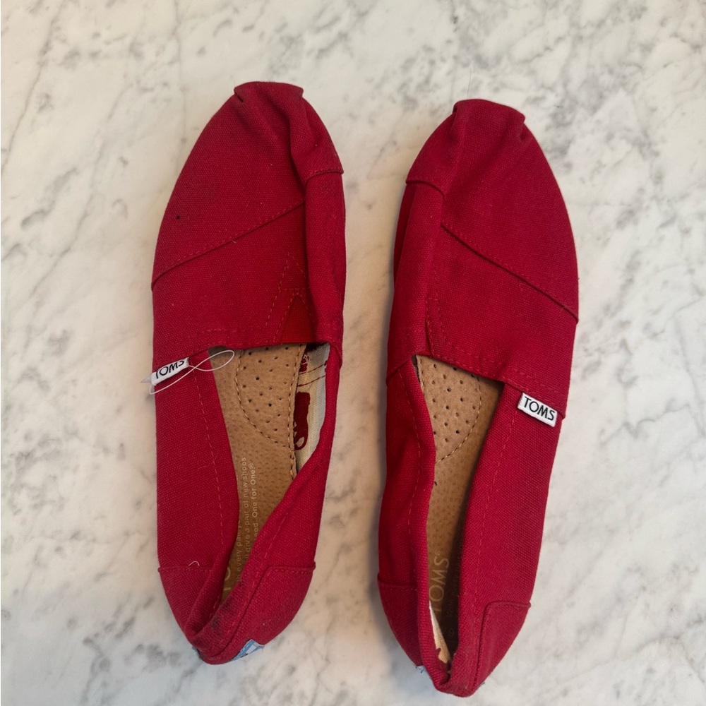 Never worn TOMS Women's Vibrant Red Canvas Loafers